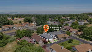 Aerial view of property's location featuring nearby suburban area