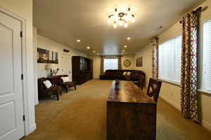 Dining area featuring carpet flooring and recessed lighting