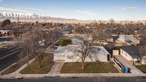 Aerial perspective of suburban area with mountains