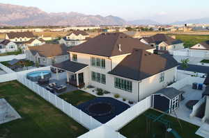Aerial view of residential area with a mountain backdrop