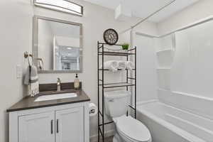 Full bathroom featuring vanity and shower / bathtub combination