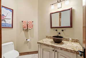 Bathroom with vanity and toilet