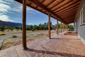 View of patio / terrace with a mountain view