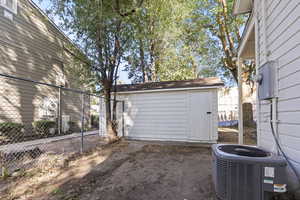 Garage featuring a storage unit