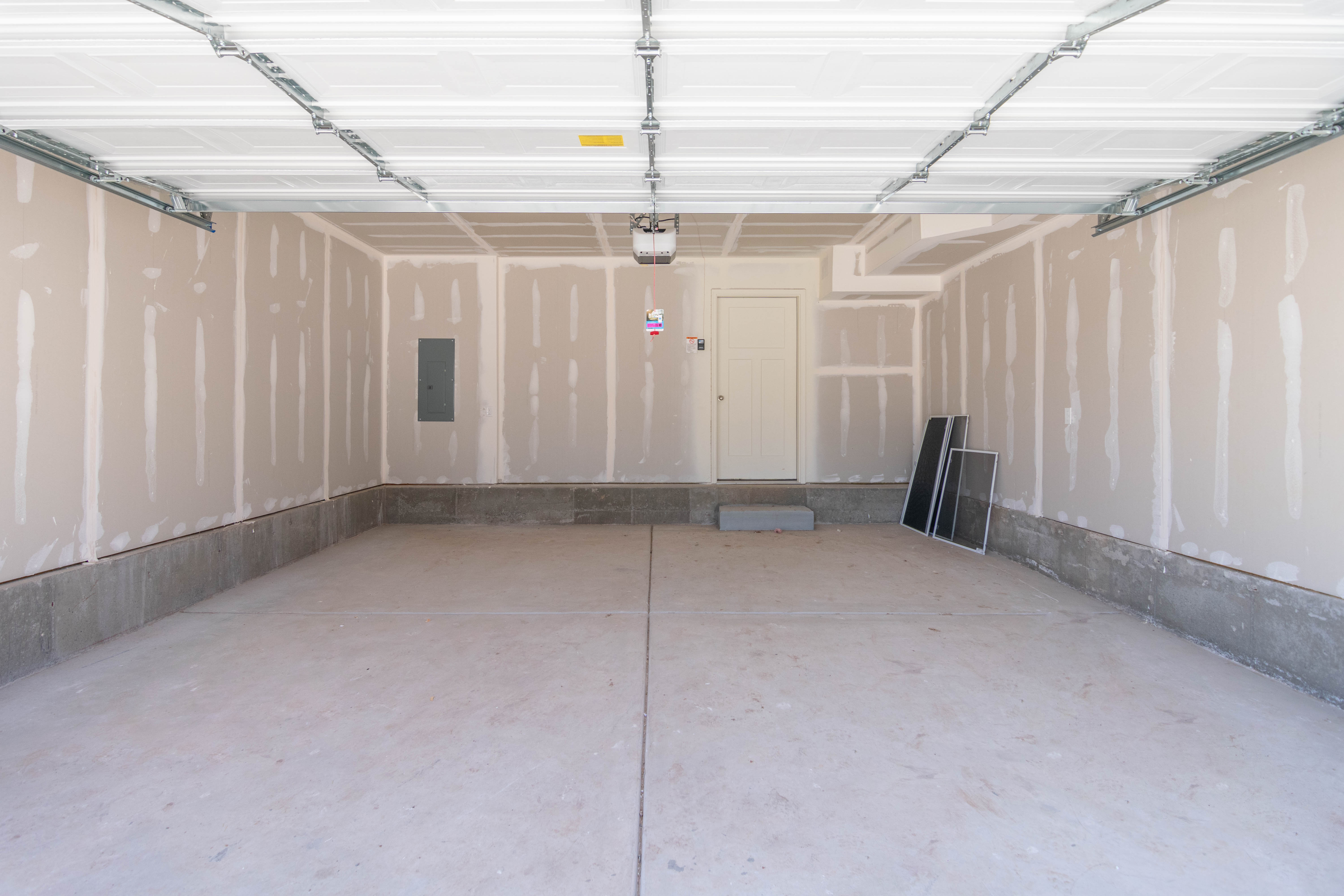 Garage featuring electric panel