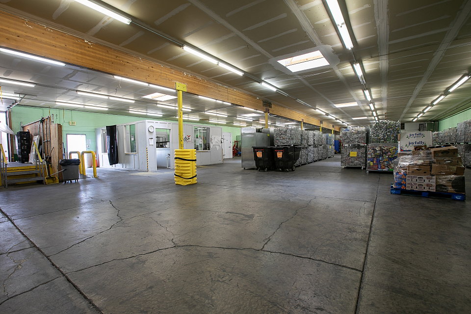Garage featuring a heating unit