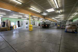 Garage featuring a heating unit