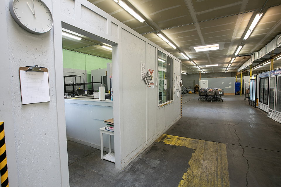 Corridor featuring concrete flooring