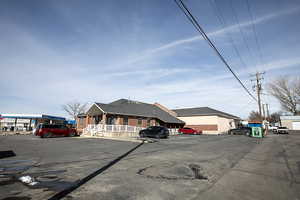 View of front of property featuring uncovered parking