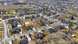 Aerial overview of property's location with nearby suburban area