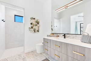 Full bathroom with vanity and a walk in shower