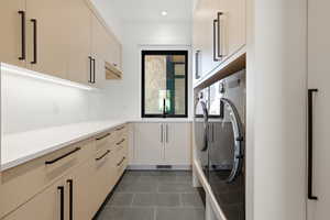 Large Main Floor Laundry (one downstairs as well)