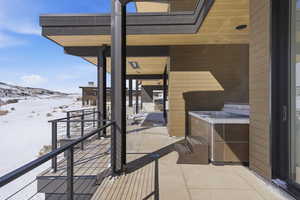 Walk out to covered Hot Tub tucked in a private setting