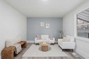 Living area featuring wood finished floors