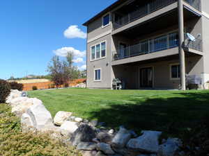 Back of house featuring a patio and stucco siding