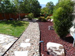 View of fenced backyard