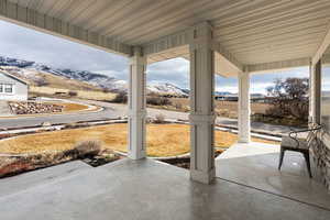 Porch featuring a mountain view