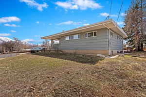 View of property exterior with a mountain view
