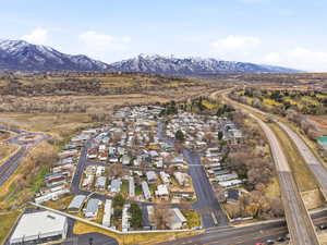 Aerial view of residential area with a mountain backdrop