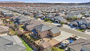Aerial view of residential area with a mountainous background
