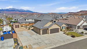 Aerial perspective of suburban area featuring a mountain backdrop