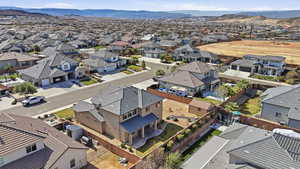 Aerial view of residential area with a mountainous background