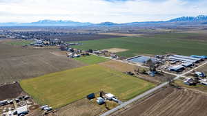 View of property location featuring rural landscape, extensive farmland, and mountains