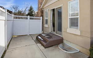 View of patio with a deck