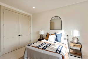 Bedroom featuring recessed lighting, a closet, and carpet floors