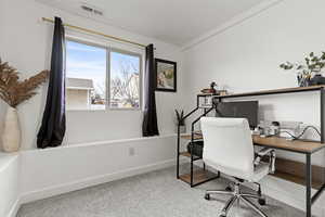 Office featuring light carpet and baseboards