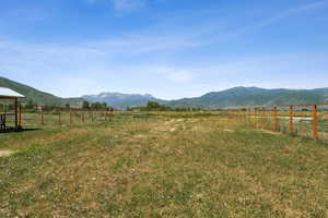 View of yard with a view of countryside and a mountain view