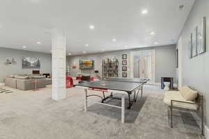 Playroom featuring french doors, carpet flooring, and recessed lighting