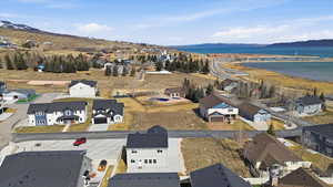 Aerial view of residential area with a water and mountain view