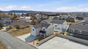Aerial view of residential area featuring a mountain backdrop