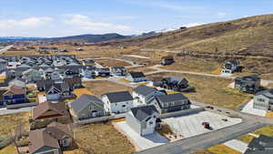 Aerial view of residential area with a mountainous background