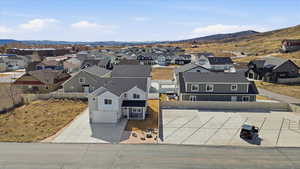 Aerial view of residential area with a mountainous background