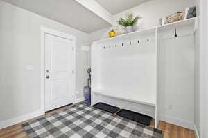 Mudroom with light wood-type flooring