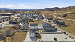 Aerial perspective of suburban area with a mountain backdrop
