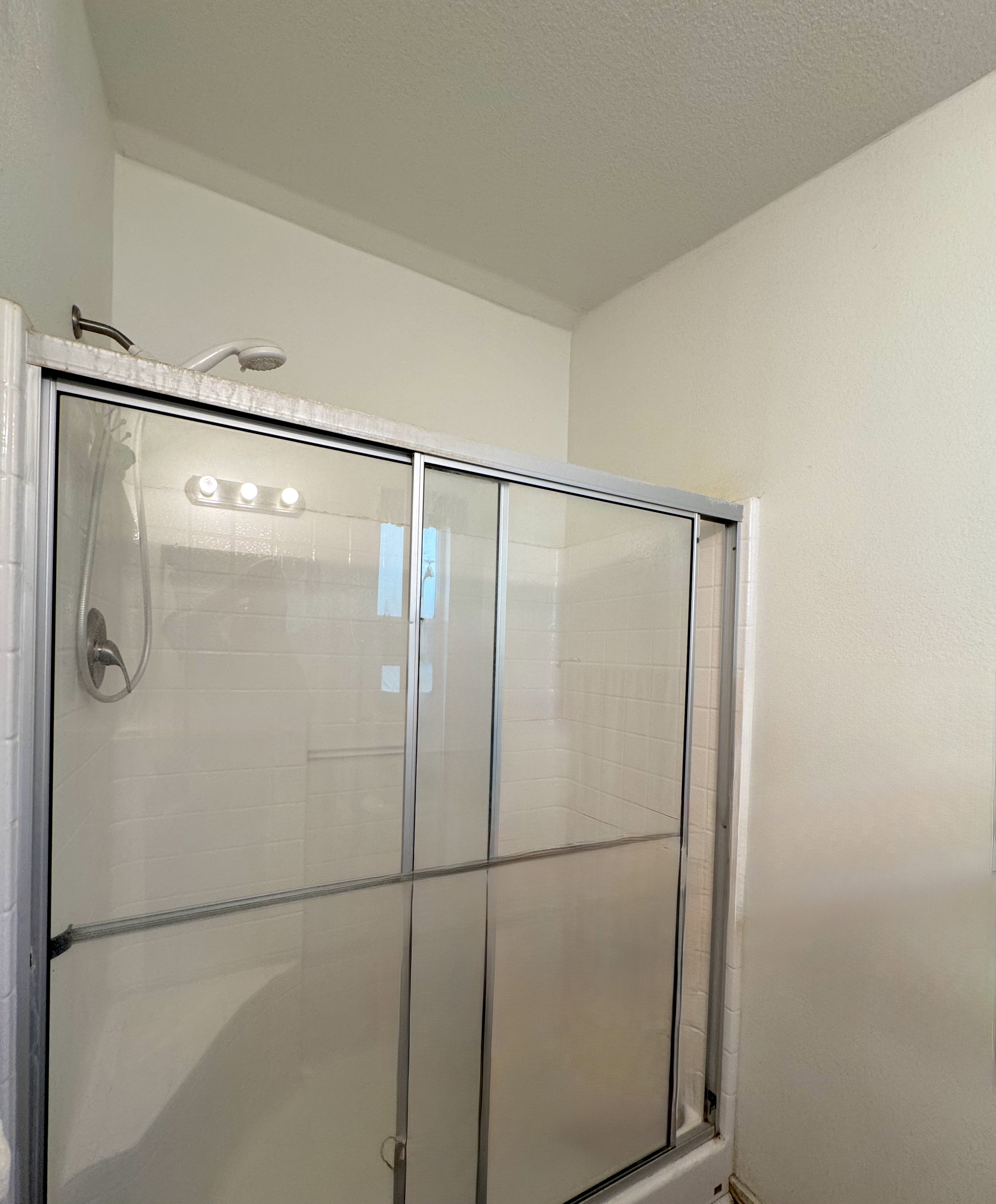 Bathroom with a stall shower