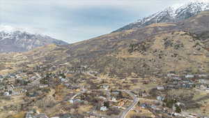 View of mountain background featuring nearby suburban area