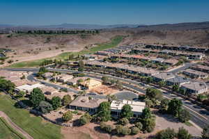 View of property location featuring a mountain backdrop and nearby suburban area