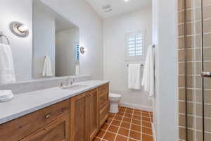 Bathroom featuring vanity and light tile patterned flooring