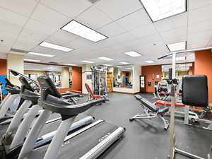Gym featuring a paneled ceiling