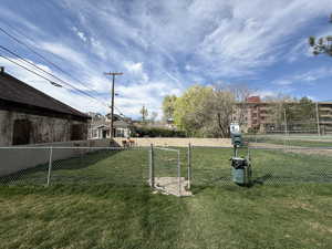 View of yard with a gate