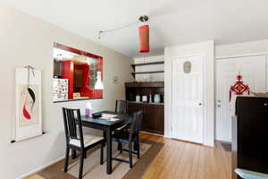 Dining space featuring light wood-type flooring