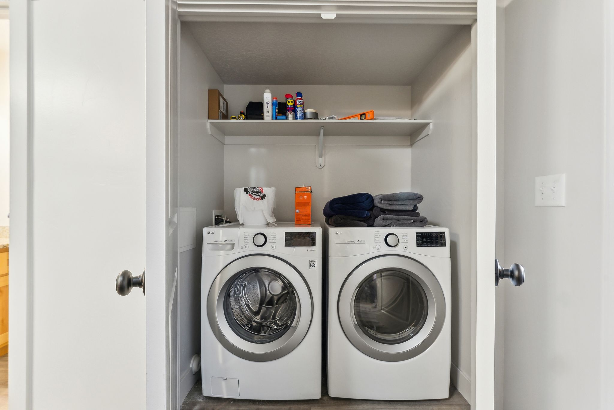 Laundry room with washing machine and dryer