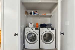 Laundry room with washing machine and dryer