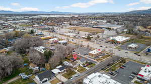 View of property location with mountains and industrial structures