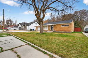 View of front of property featuring brick siding