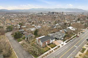 View of urban area with a mountain backdrop and nearby suburban area